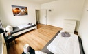 Schlafzimmer mit 2 Einzelbetten und Handtüchern